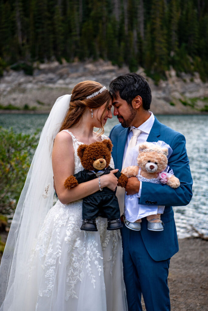 bride and groom holding wedding theme build-a-bears