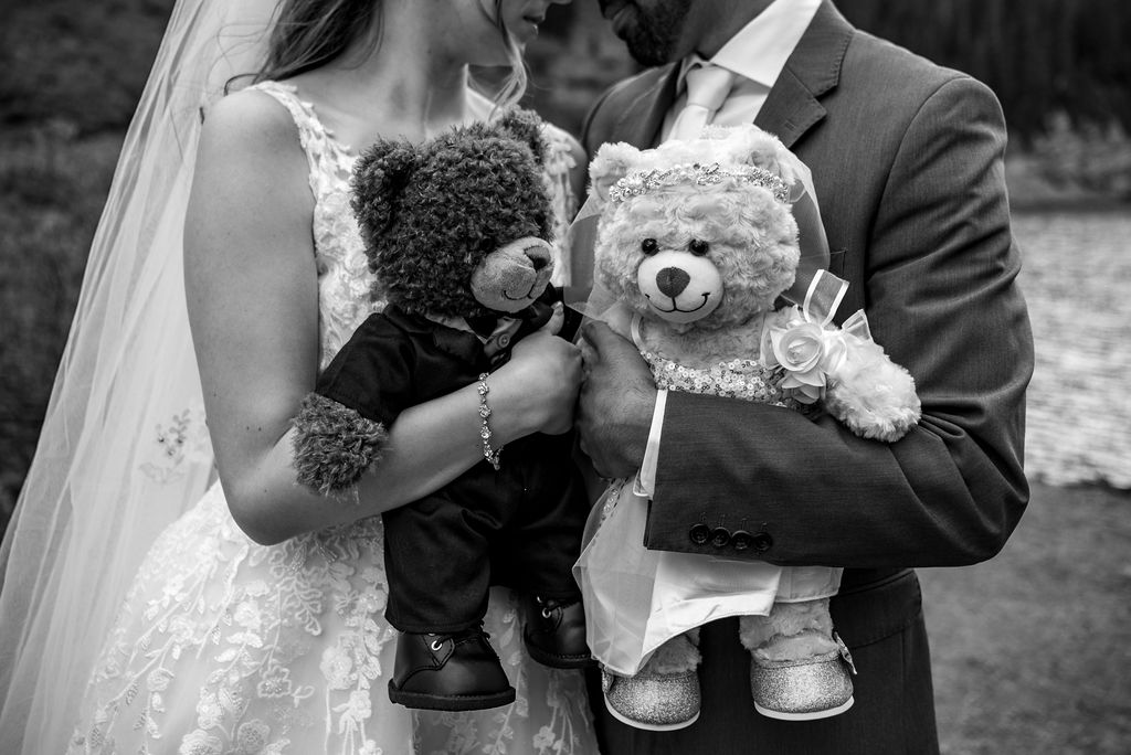bride and groom holding wedding theme build-a-bears