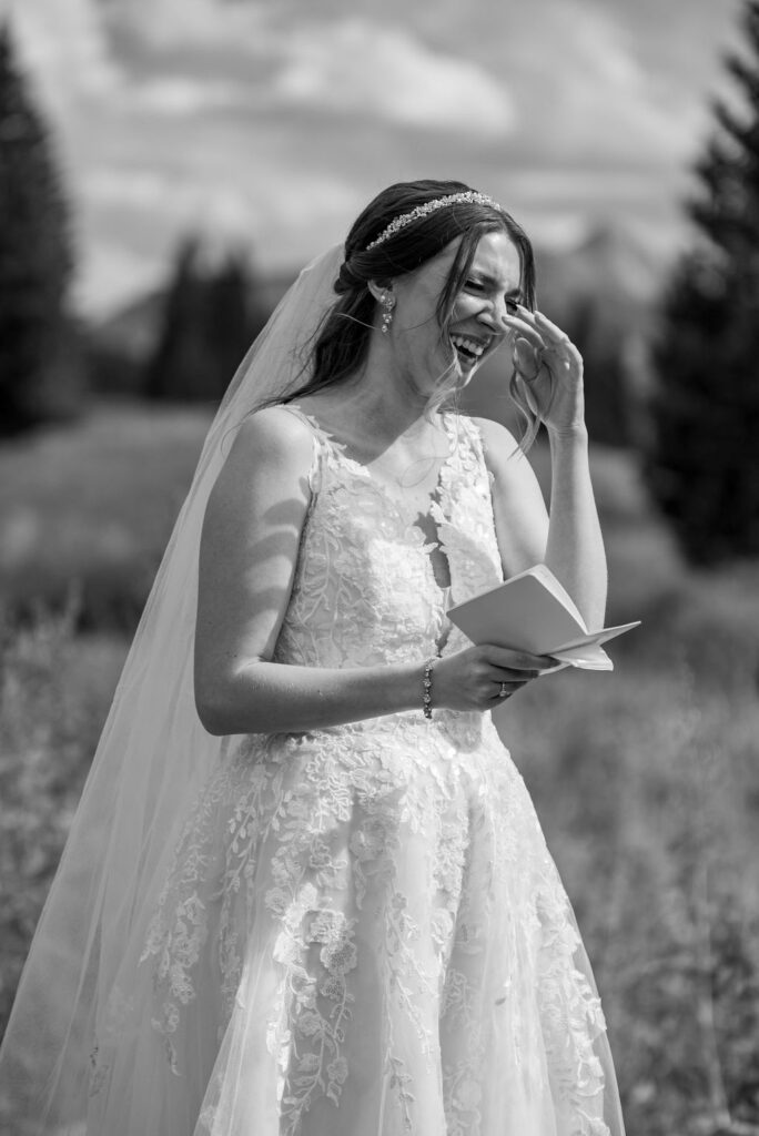 bride and groom exchanging vows during their crested butte adventure elopement
