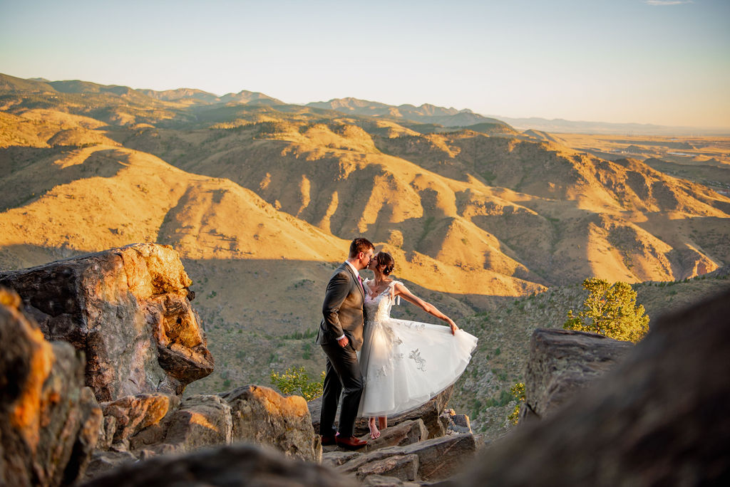 bride and groom kissing during their colorado mountain elopement