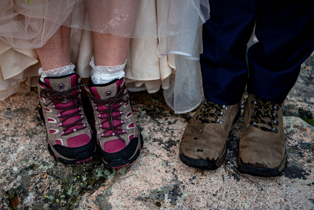close up of bride and groom's hiking boots