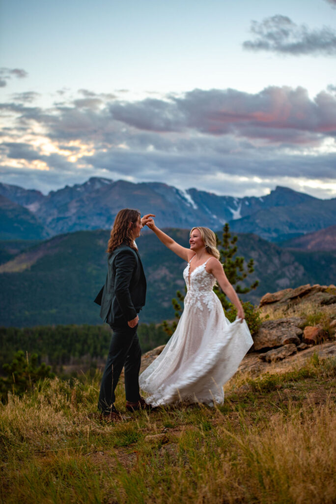 bride and groom elopement photos with Colorado mountains in the backdrop