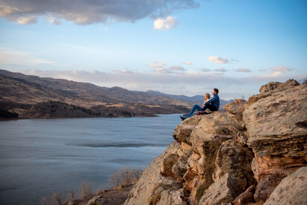 a couple looking at the river in horsetooth reservoir