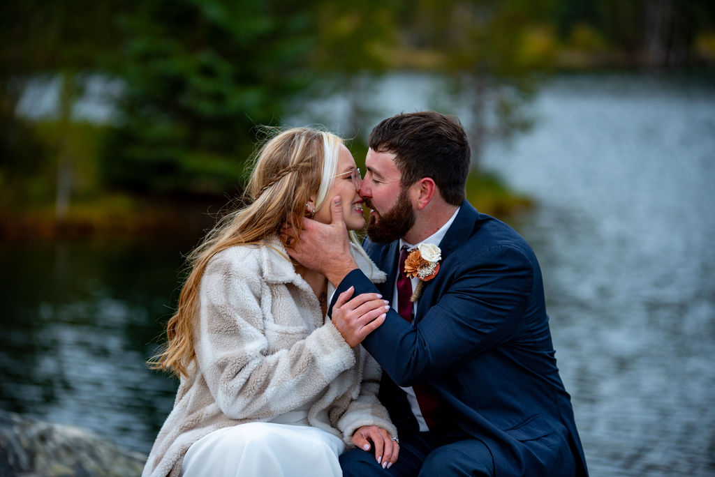 a romantic bride and groom kiss