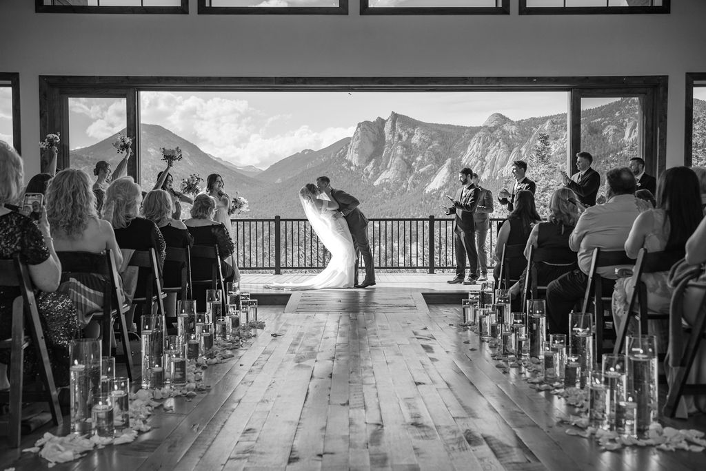 bride and groom first kiss