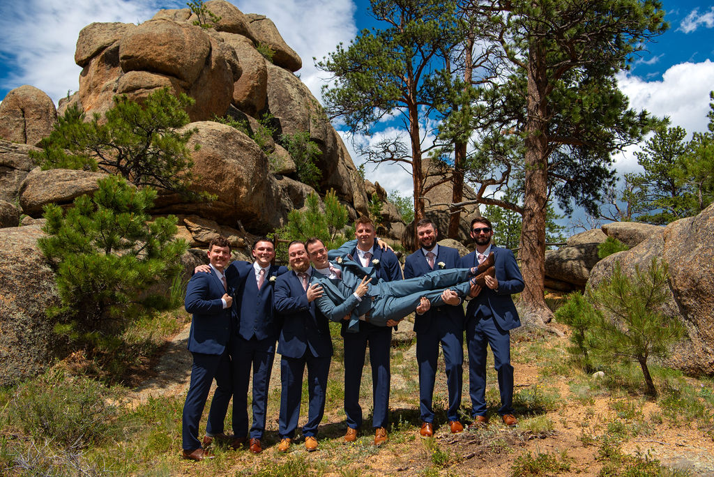 fun groom and groomsmen photos during the wedding at Black Canyon Inn